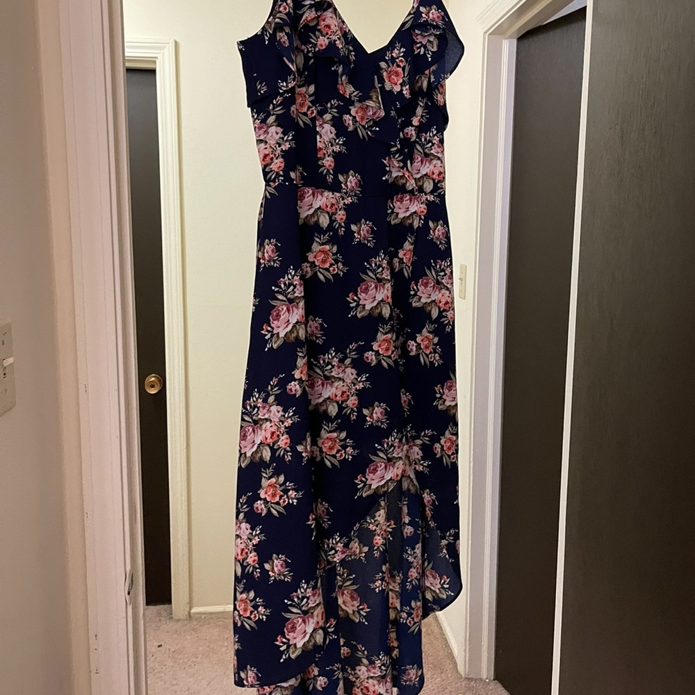 Floral blue romper dress. Short in front and long in back